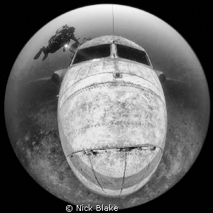 Jet Plane and diver, Capernwray.
Sigma circular fish eye... by Nick Blake 